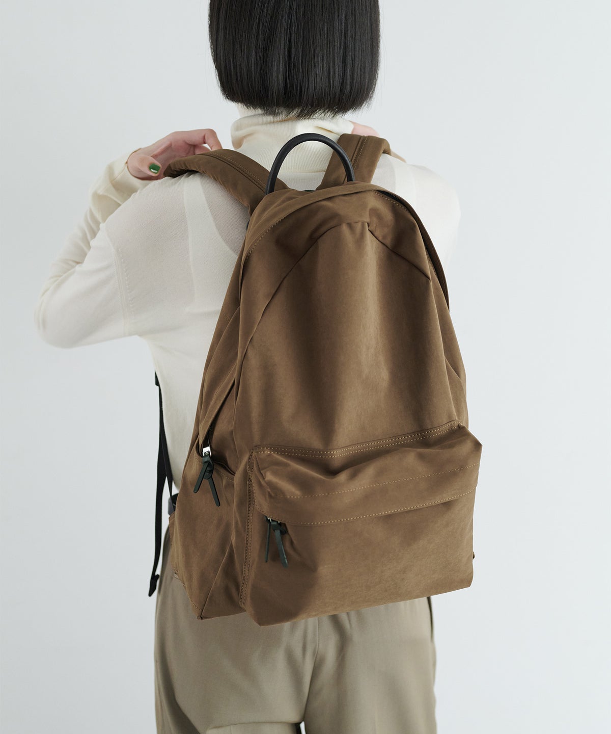現在こちらのカラー（SEPIA）の展開はございません。モデル身長：173cm
