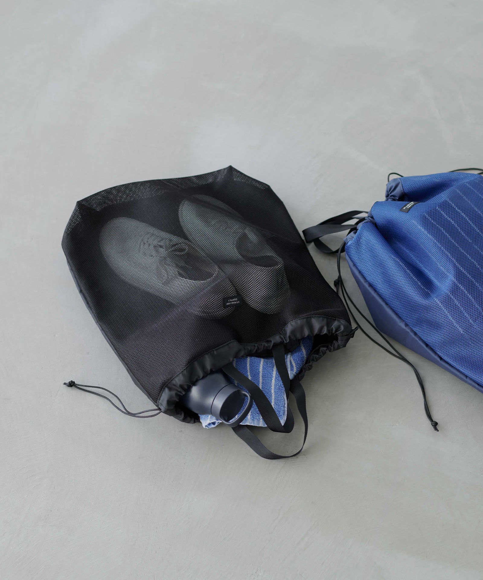 DRY GOODS 2R DRAW STRING POUCH 2ルームドローストリングポーチ